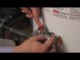 If they are lit, you will need to go outside and push the reset buttons on the water heater. How To Reignite A Hot Water Heater Hot Water Heaters Youtube