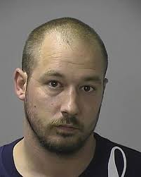 Father of man who killed Kalamazoo police officer Eric Zapata indicted