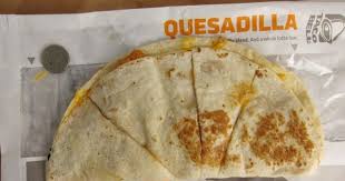 It's made with chicken, cheese, and flour tortillas. Review Taco Bell Crispy Chicken Quesadilla Brand Eating