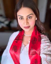 She carries the sky in her eyes, the storm in her soul, and flowers in her  footsteps— soft enough to heal, wild enough to burn