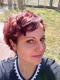 54 and “bronde”! I started growing out a pixie 15 months ago. I am FINALLY  “there”.