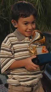 From the #Grammys stage to the #SuperBowl, @badbunnypr took a sweet moment to honor last week’s Album of the Year win—and pass it on to the next generation of superstars.