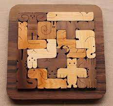 It's important not to overwhelm the child with more pieces than they can handle. Living Blues Magazine Kids Wooden Toys Wood Puzzles Wood Crafts
