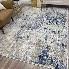 We have an outstanding selection of rugs to choose from, and you can narrow search by color, pattern and even price to make shopping easy. Gold Foil High Low Auden Area Rug 8x10 Blue And Gold Living Room Area Rugs 8x10 Area Rugs