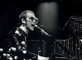 Elton john released his debut album empty sky in 1969, though it didn't appear in the u.s. Elton John 70s Your Song Elton John 1050x768 Download Hd Wallpaper Wallpapertip