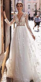 The geometric lace on lilana by maggie sottero channels a vintage aesthetic that's cool and unexpectedly modern. 24 Best Lace Wedding Dresses With Sleeves Wedding Dresses Guide Lace Wedding Dress With Sleeves Ivory Bridal Gown White Lace Wedding Dress