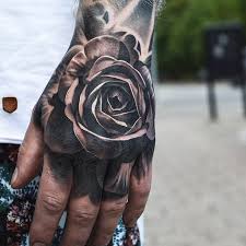 Pin By Lilxbatt W On Tattoo S Hand Tattoos For Guys Rose Hand Tattoo Hand Tattoos