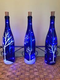Handpainted Lighted Blue Wine Bottle With Birch Trees And Etsy Wine Bottle Crafts Christmas Blue Wine Bottles Bottles Decoration