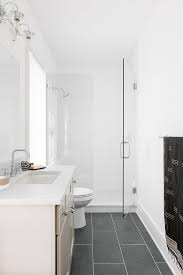 Crisp White Bathroom With Black Slate Floor Tile Bathroom Black Slate Floor Tile Blackslatefloortile Black Slate Floor Slate Tile Floor Slate Bathroom Tile