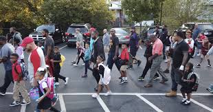 Elementary school celebrates dads with morning walk