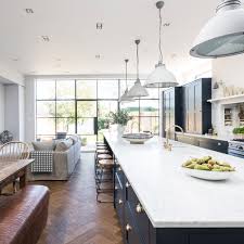 When you've got a larger home with a larger kitchen for your larger family, you'll need to think about all the details involved in their comfort. 50 Kitchen Island Ideas Inspiration For Workstations Storage And Seating