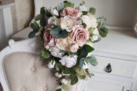 Your wedding dress in gorgeous , your veil's amazing. A Gorgeous New Design In Our Luxury Range Of Silkweddingbouquets A Beautiful Dusky Pink Trail Bridal Bouquet Pink Bridesmaids Bouquets Pink Wedding Bouquets