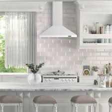 Range hoods should be at least 3 inches wider on each side than the range or cooktop, and should be as low as 18 in. Range Hoods