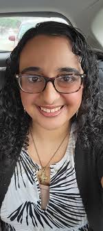 Posing with my natural hair. Yes this is my natural curly hair :-)