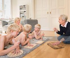 Grandma teaches blond children important life lessons : rwtfstockphotos