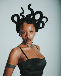 channeling an otherworldly essence, the intricate hair design transforms  this look into a surreal masterpiece • photographer: @ryan.wimsatt stylist:  @daissydreams