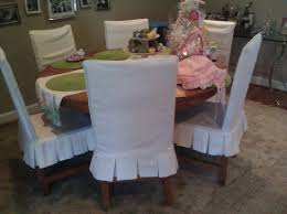 You can choose from a variety of fabric patterns and materials for your covers, ensuring that your new chair cushions match the look of your dining room design. Dining Chair Slipcovers Houston Slipcovers By Elegant Upholstery