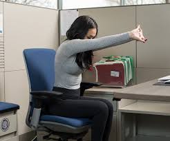 6 Stretches To Relieve Muscle Stiffness You Can Do At Your Desk At Work Gymguider Com How To Do Yoga Upper Back Stretches Desk Stretching