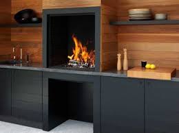 Des Cuisines D Ete Pour Tous Les Styles Elle Decoration Cuisine Exterieure Foyer En Acier Meuble Plancha