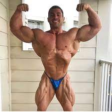 Bodybuilder Bulge, Posing Trunks, VPL: Derek Lunsford and his 6 oclock  type Visible Penis Lines