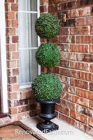 Artificial topiary trees are commonly used for landscape architect's designs. The Easiest Diy Topiary Trees On A Budget Topiary Decorating Ideas