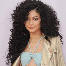 It's super cute and should only take a couple of minutes to create, and is one of those hairstyles for curly thick hair that looks just as fab from coffee to cocktails. Best Haircut Ideas For Curly Hair Teen Vogue