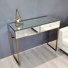 This elegant luxor mirrored dressing table is trimmed in silver mirrors and features crystal handles, metal drawer runners and a pillar leg design to bring a touch of class to any bedroom, guest room or dressing room. China Glass Dressing Table Glass Nightstand Glass Dresser Supplier