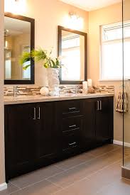 Use reflective bathroom tile ideas to bounce the light. The Spotted Frog Custom Furniture Bathroom Beige Countertop Bathrooms Remodel Bathroom Design