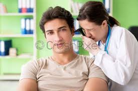 Public health service specifies for u.s. Female Doctor Checking Patientqts Ear During Medical Examination Stock Photo Crushpixel