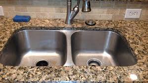 No matter what, always make sure there's fill up your kitchen sink with enough warm water to cover the sink parts then add about 1/4 cup of bleach. How Pouring Grease Down The Drain Can Cost You Angi Angie S List