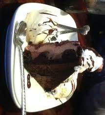 A dark cocoa cake covered with two kinds of chocolate. Chocolate Stampede Picture Of Longhorn Steakhouse North Haven Tripadvisor