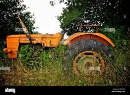 Image result for Orange Red 1972 Tractor