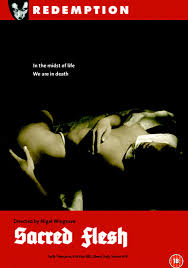 Michelle thorne lying on the ground in a nun's outfit as she masturbates, including explicit shots in between her legs while she continues to masturbate. Sacred Flesh Salvation Films
