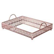 Crafted from metal in an antiqued gold finish, this coffee table showcases an open geometric design throughout. Amalfi Decor Giovanni Serving Tray Color Rose Gold In 2021 Rose Gold Serving Tray Rose Gold Decor Mirror Tops