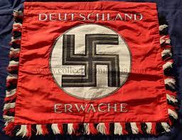 There is no tool more powerful in a nationalist culture than aesthetics and while i have heard every reason under the sun for collecting third reich memorabilia and peoples interests, it is without a doubt about the aesthetics. Deutschland Erwache Standard Flag