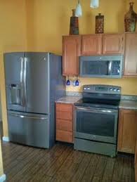 So you want new kitchen cabinets—are you prepared for all the costs that come with them? 7 Galley Kitchen Remodel Ideas Galley Kitchen Remodel Kitchen Remodel Galley Kitchen
