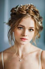 I love the crown braid because it's just one of those classic styles you can't go wrong with. 10 Flower Crown Hairstyles For Any Bride Mywedding Crown Hairstyles Bohemian Wedding Hair Flower Crown Hairstyle