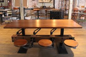 Other versions of swing tables that the company offers are a square 8 seater with 2 swing seats on each side of the table, a 6 seater that's blue, a smaller white 4 seater. Swing Out Seat Kitchen Dining Table Set For Sale At 1stdibs