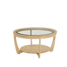 Dream about what you want the room to look like and imagine yourself in all the different scenarios where you will be using your new table. Shades Oak Nathan Shades Oak Glass Top Round Coffee Table Coffee Tables Cookes Furniture
