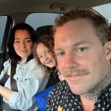 Who provides lawn mowing services in Toowoomba?