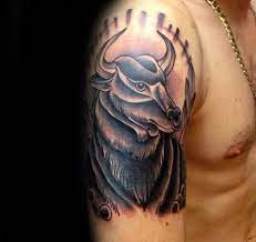 Tribal bulls head taurus tattoo for men on upper arm. Top 75 Taurus Tattoo Ideas 2021 Inspiration Guide Taurus Tattoos Bull Tattoos Tattoos For Guys