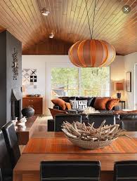 Burnt orange boho bedroom decor make a blank space pop with line art prints. Black Burnt Orange Family Room Living Room Orange House Design Home Decor
