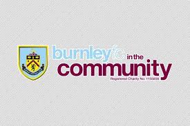 The wavy line in blue colour means the river brun; Burnley Fc Community Walking Football Turf Moor