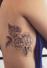 30 Delicate Flower Tattoo Ideas Rib Tattoo Rose Rib Tattoos Rib Tattoos For Women