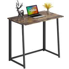 There are also plastic folding tables, half tables and table sets to consider, depending on what you need. 4nm Folding Desk Small Computer Desk Home Office Desk Foldable Table Workstation For Small Places Rustic Brown And Black Buy Online At Best Price In Uae Amazon Ae