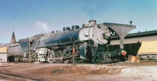 Union Pacific Mt 1 Class 4 8 2 Alco Built Mountain Type Steam Locomotive 7857 Is Seen Leading A Passenger Train While At The Station In Cheyenne Wyoming 10 Steam Locomotive Train Locomotive