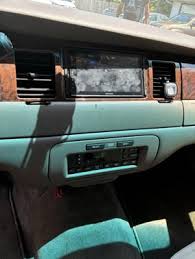 Image result for Medium Gold 1998 Town Car