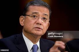 Daniel Dellinger, national commander of the American Legion, listens...  News Photo