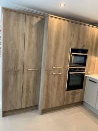 Ush download chevy van truck parts compositores del periodo clasico like logo png batismo! Modern Grey Gloss Grey Wood Grain Kitchen White Quartz Worktops Neff Appliances