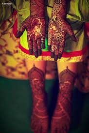 Photo Of Mehendi Design With Bride And Groom Portraits On Hands Mehendi Designs Indian Wedding Couple Photography Indian Wedding Couple